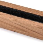 EDHAS vertical laptop stand made of light acacia wood, holding a silver laptop on a clean desk.