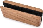EDHAS vertical laptop stand made of light acacia wood, holding a silver laptop on a clean desk.
