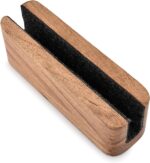 EDHAS vertical laptop stand made of light acacia wood, holding a silver laptop on a clean desk.