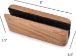 EDHAS vertical laptop stand made of light acacia wood, holding a silver laptop on a clean desk.