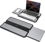 EHO Laptop Lap Pad in black and gray, shown with a laptop on a bed, with the retractable mouse pad extended.