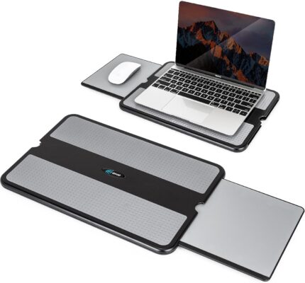 EHO Laptop Lap Pad in black and gray, shown with a laptop on a bed, with the retractable mouse pad extended.