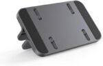 Spacegrey aluminum vertical laptop stand holding a MacBook Pro, showcasing its sleek design and desktop organization.