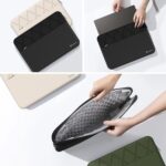 Elite-Black Smatree 13.5 inch laptop sleeve with an accessory pocket, designed for Microsoft Surface Laptops.
