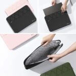 Black Smatree laptop sleeve for 16.1 inch HP OMEN Gaming Laptop with an accessory pocket, shown on a flat surface.