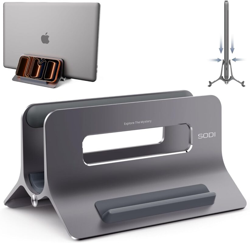 A space gray SODI vertical laptop stand holding a MacBook in an upright position on a clean desk.