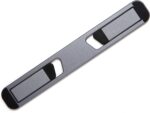 Space Grey Triyards self-adhesive foldable laptop stand attached to the underside of a laptop, elevating it.
