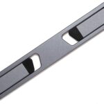 Space Grey Triyards self-adhesive foldable laptop stand attached to the underside of a laptop, elevating it.