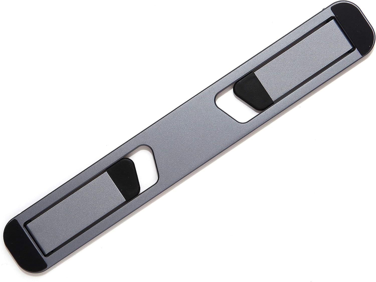 triyards-self-adhesive-aluminum-foldable-laptop-stand-space-grey-01 Space Grey Triyards self-adhesive foldable laptop stand attached to the underside of a laptop, elevating it.