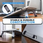 Space Grey Triyards self-adhesive foldable laptop stand attached to the underside of a laptop, elevating it.